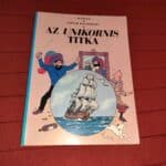 Az Unikornis titka (Tintin kalandjai 11.) (a borítót kicsit kiszívta a nap, de tökéletes állapotú)